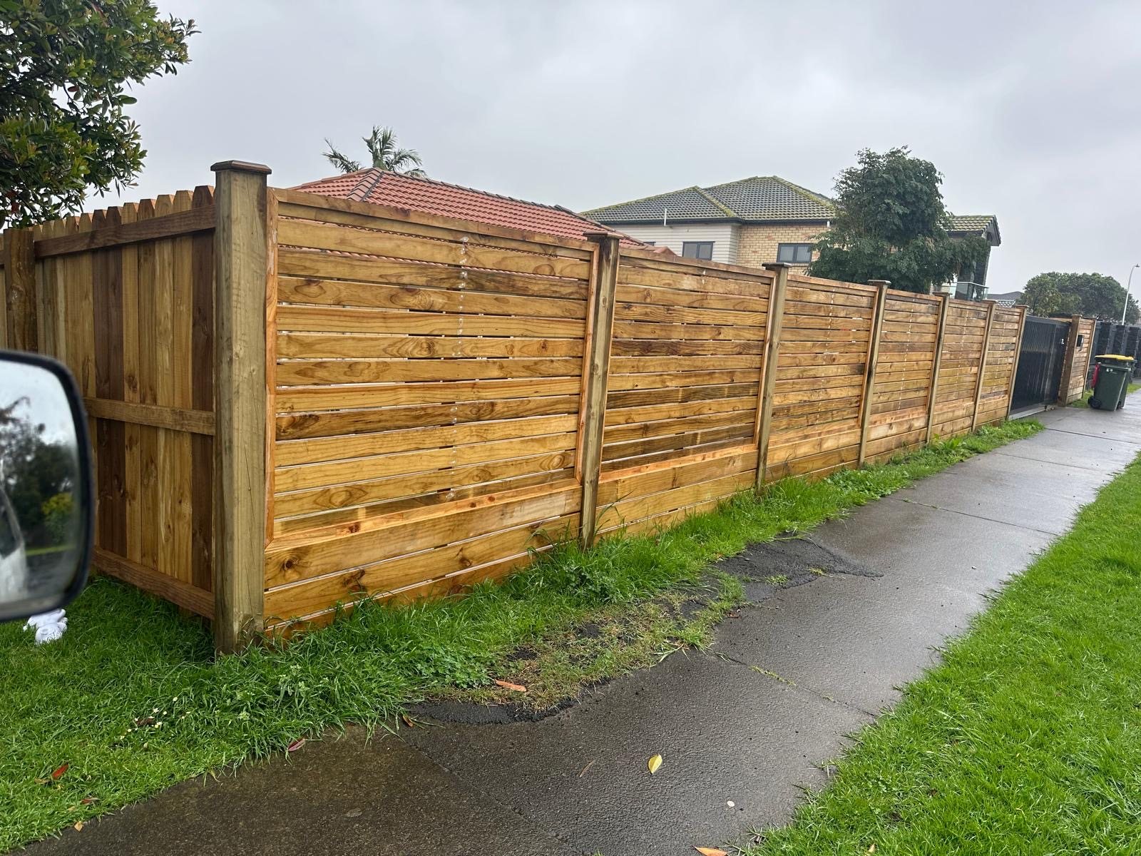 Long completed timber boundary fence beside an Auckland property